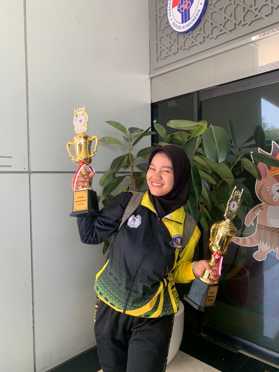 Mahasiswa Bisnis Digital FEB UNILA Meraih Juara Indonesia open marching band festival piala kementrian pemuda dan olahraga